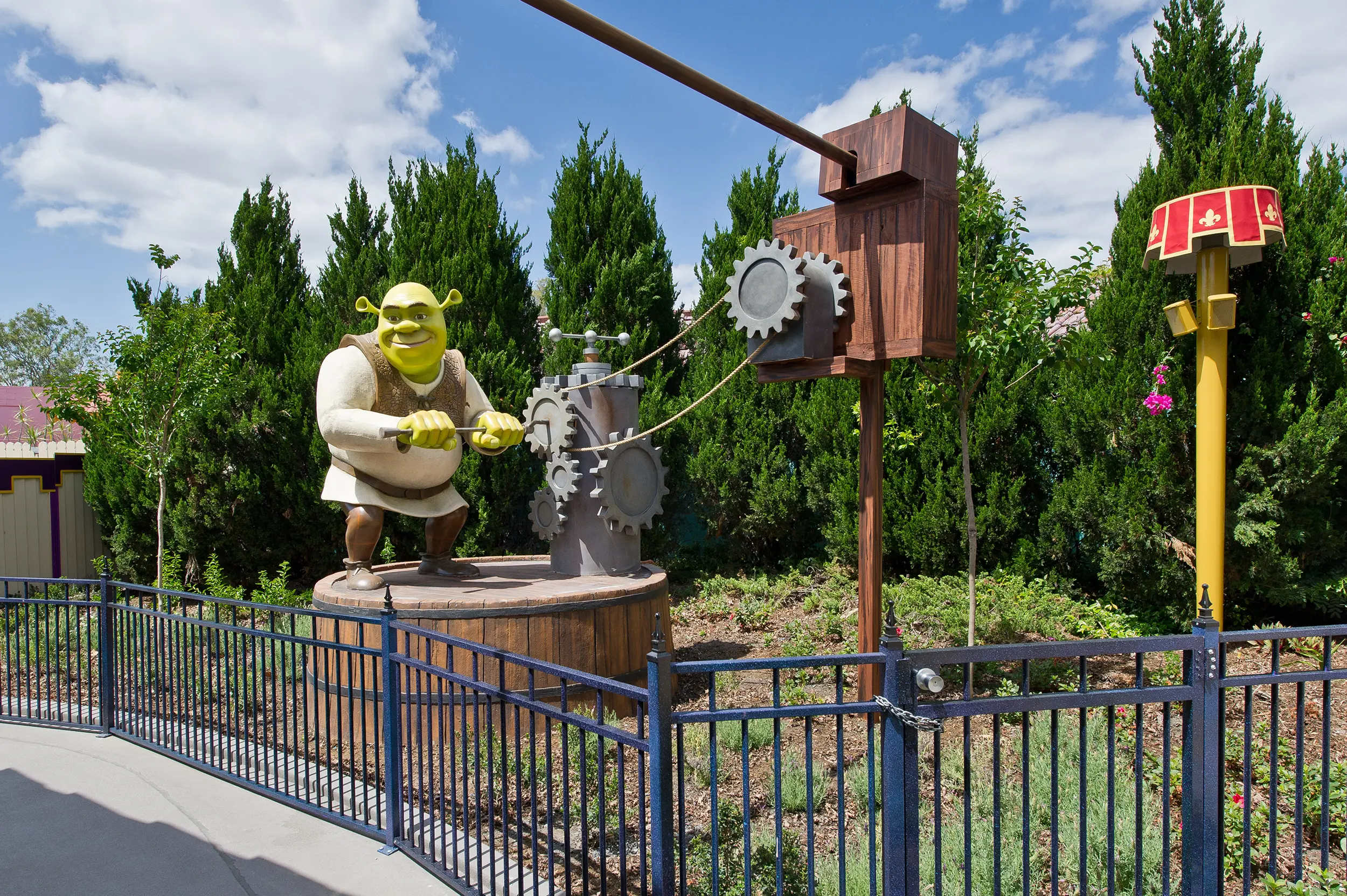 Photo of Shrek with shrubs behind